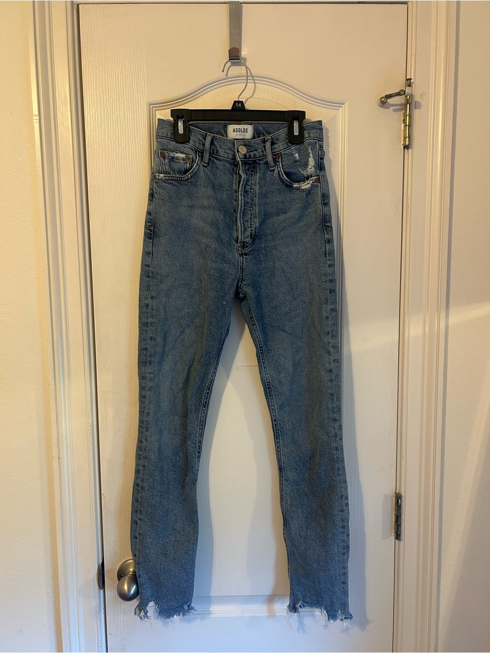 Agolde High-Rise Light Blue Distressed Hem Jeans